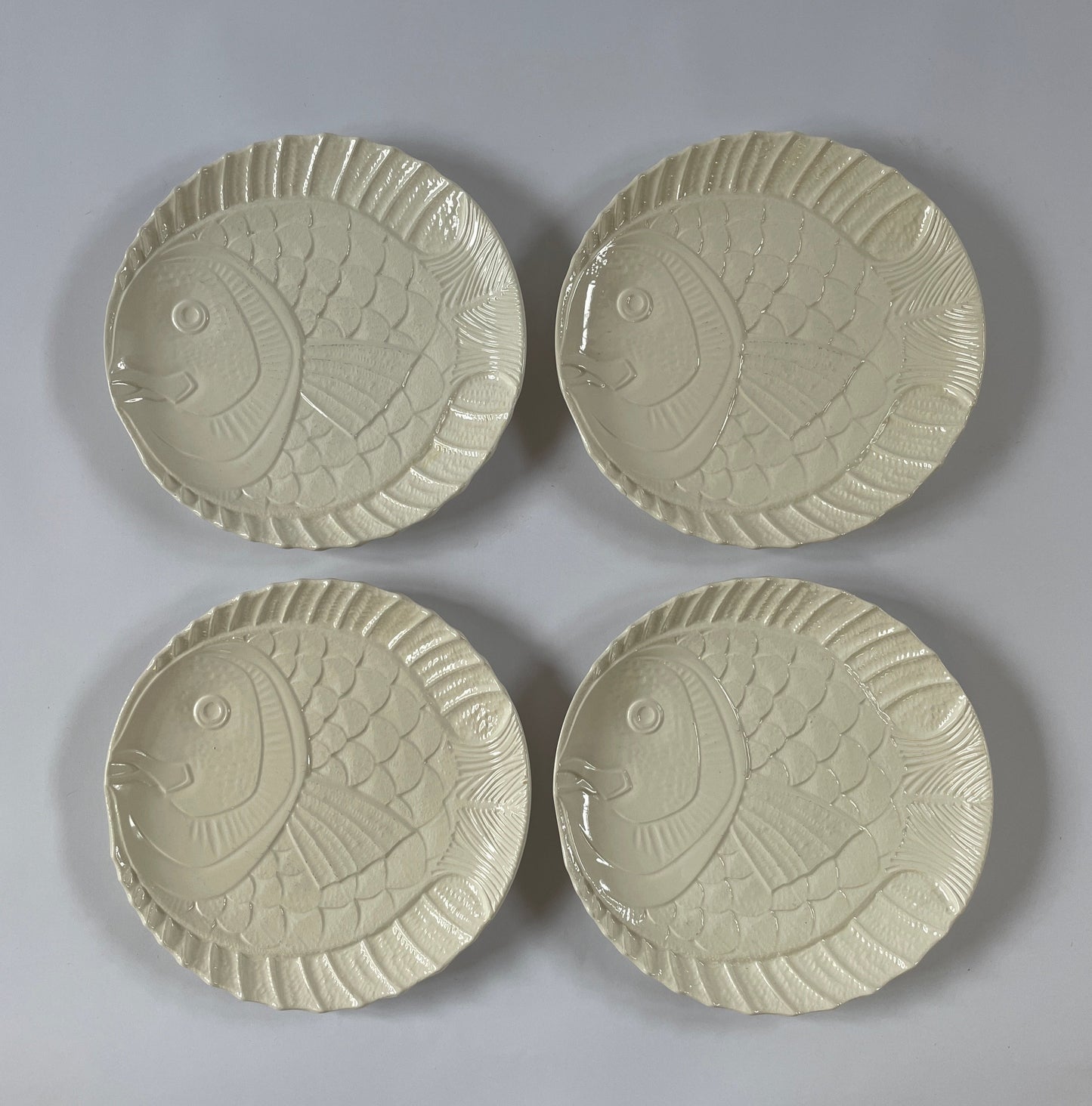 Set of 8 Vintage Creamware 'Garanti' Plates.