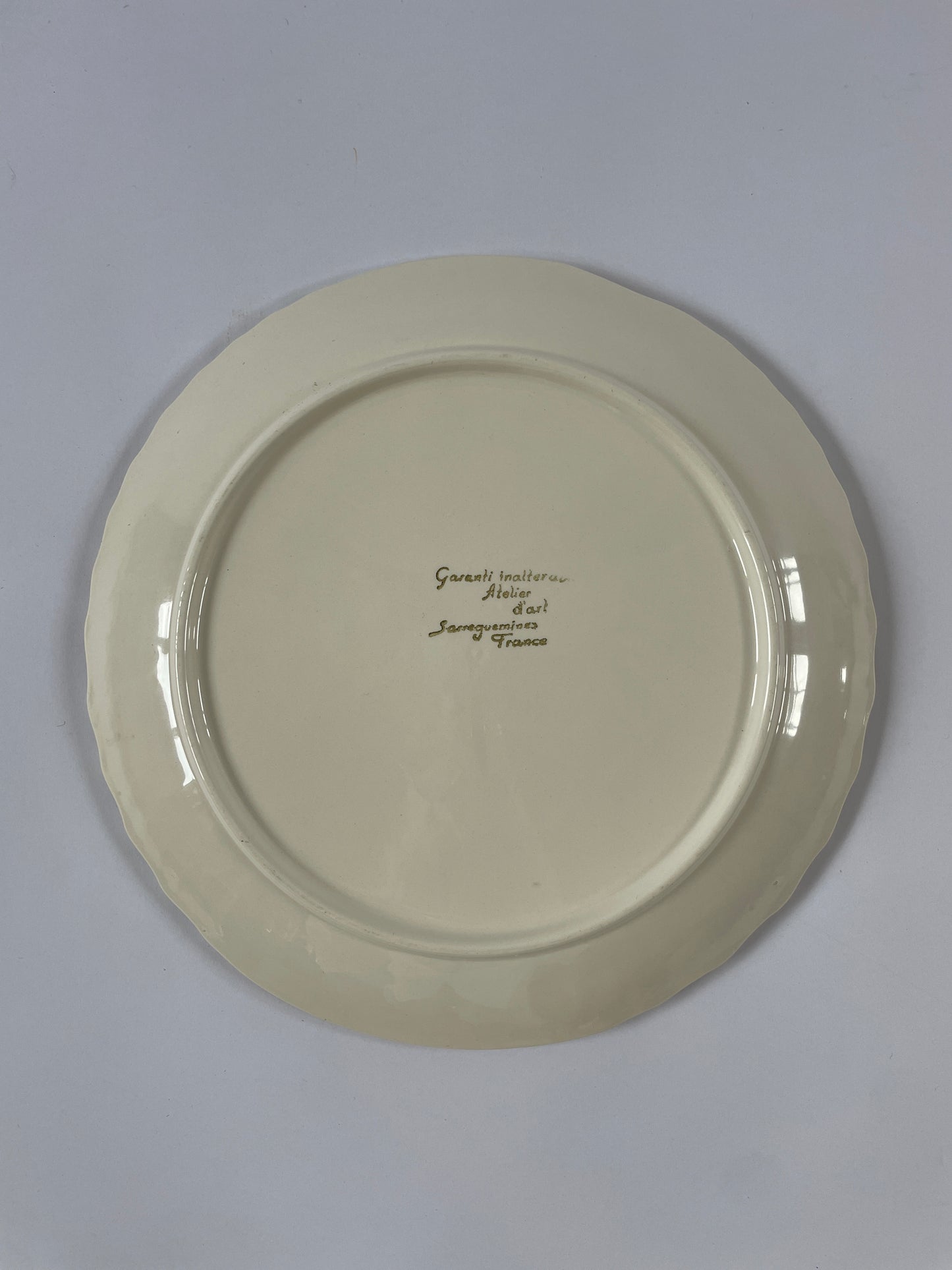 Set of 8 Vintage Creamware 'Garanti' Plates.